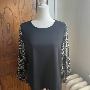 Silky Black and White Geometric Blouse with Sheer Pleated Sleeves
